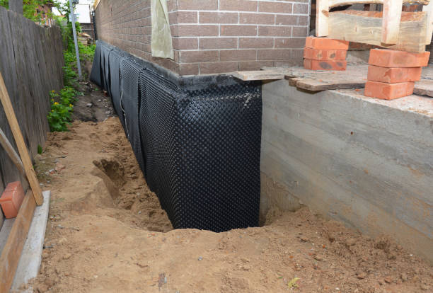 Happy homeowners after waterproofing job in Horsham